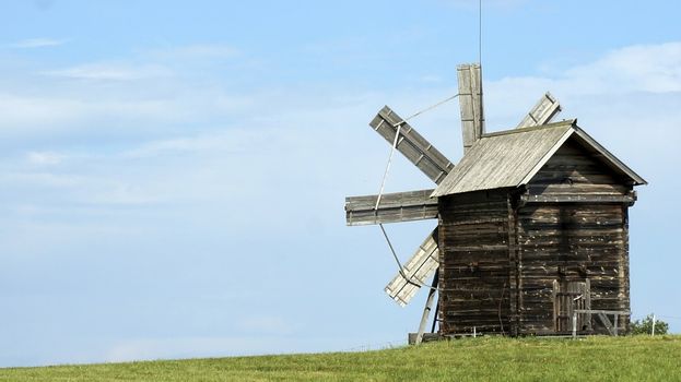 Old Russian windmill in a field, a wonderful rustic look, the background.