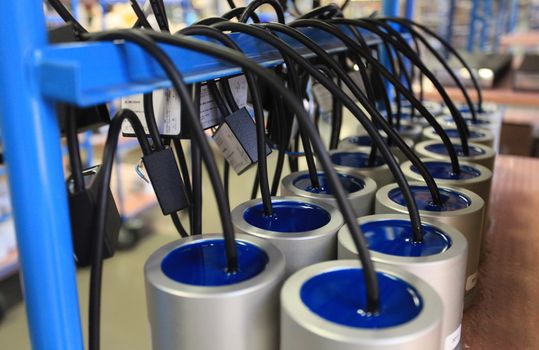 assembly of electronic equipment in manufacturing  shallow depth of field 