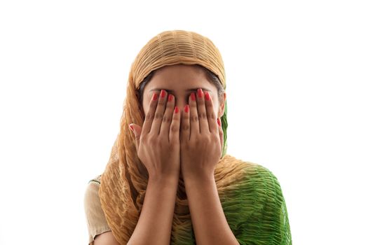 Beautiful young Indian Muslim girl praying