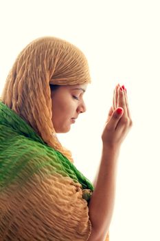 Beautiful young Indian Muslim girl praying