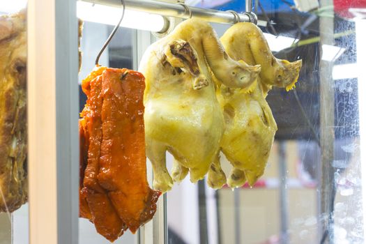 Boiled chickens and cooked red pork - Popular Thailand food