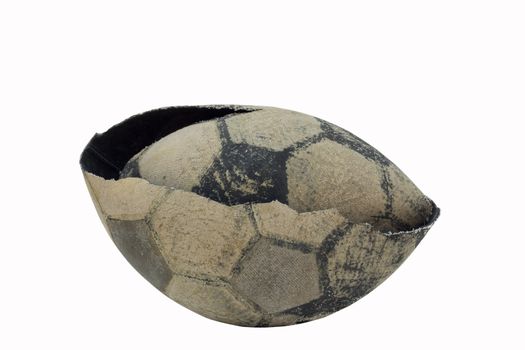 The oldbroken soccer ball isolated on white background