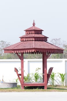 Traditional thai pavilion wooden by the street in Thailand