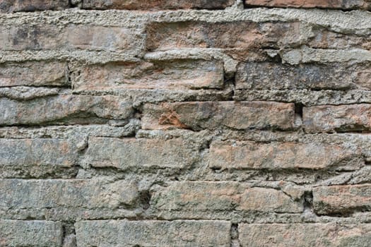 old wall of stone bricks textured background