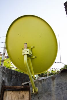 yellow satellite disc - back view