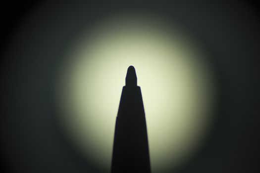 Ballpoint biro pen silhouette photograph.