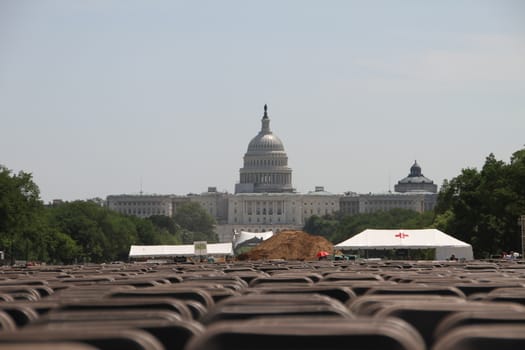 Washington DC, USA - may 19, 2012. View of the Capitol building in Washington with lawn and put chairs for public events