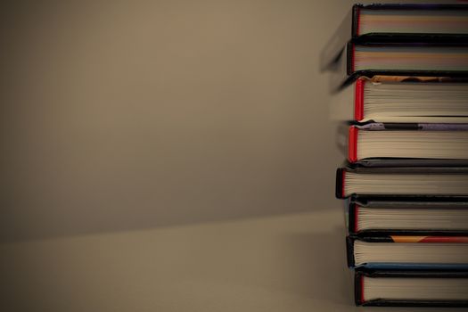 stack of books on the table. with copy-space, instagram image style