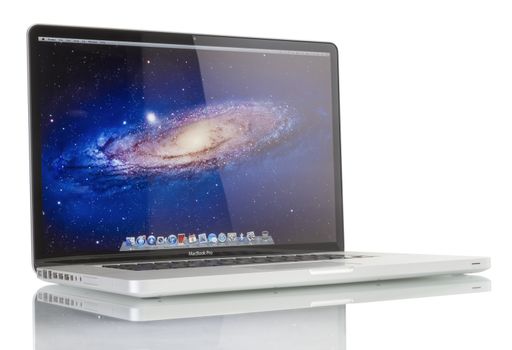 Galati, Romania - December 08, 2014: Studio shot of brand new Apple MacBook Pro laptop computer by Apple Inc. on a white background. This MacBook Pro has a 17-inch antiglare widescreen display and is running the OS X Snow Leopard 10.6.3 operating system.