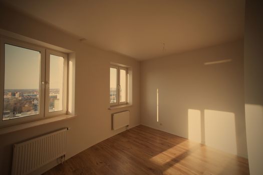 interior of a empty new room with sun spots, instagram image style