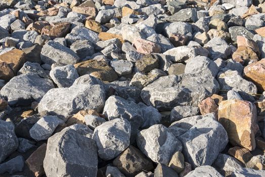 big rocks in grey and brown as solid background