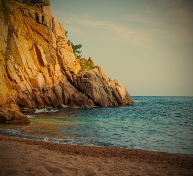 Tossa de Mar, Catalonia, Spain, 06.17.2013, a small beach near Cap de Tossa, instagram image style