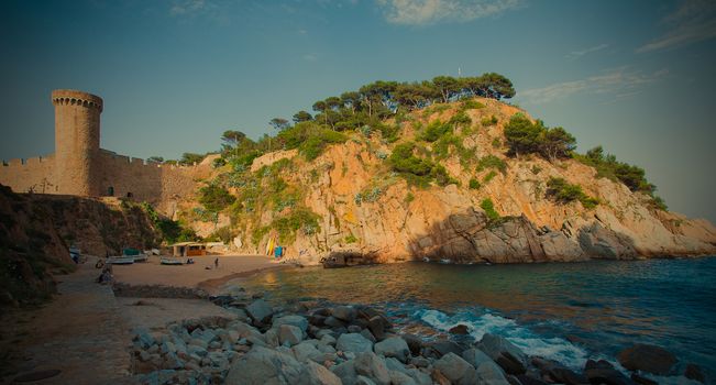 Spain, Catalunya, Tossa de Mar 06.13.2013, the beach El Codolar and the medieval fortress Vila Vella,  instagram filter style, editorial use only