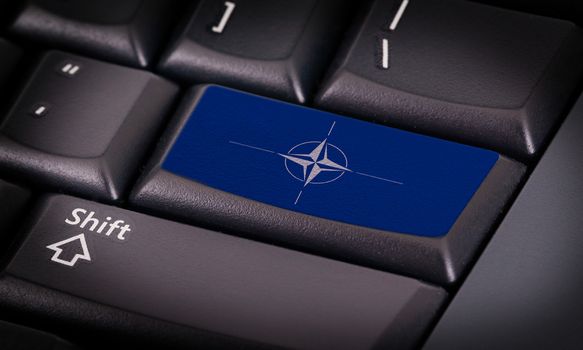 Symbol on button keyboard, blue NATO button