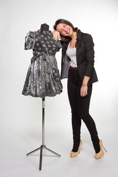 Woman with dressed mannequin