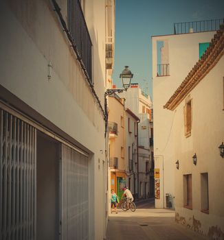 Tossa de Mar, Catalonia, Spain JUNE 19, 2013: the streets of the old town. Instagram image style
