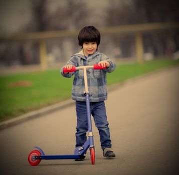 a boy with a new scooter on open air, instagram image style