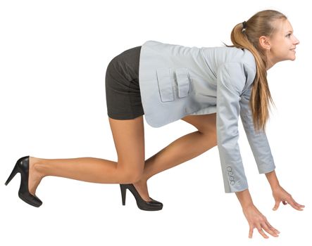 Businesswoman standing in running start pose, smiling, side view. Isolated over white background