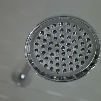 Close up of a silver shower head