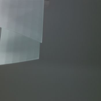 glass light fixture on a wall