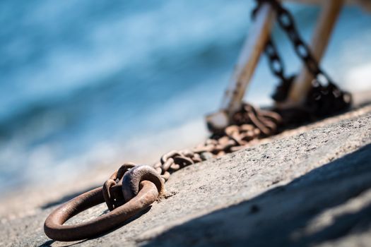 Rusty chains for small fishing boats in Riposto