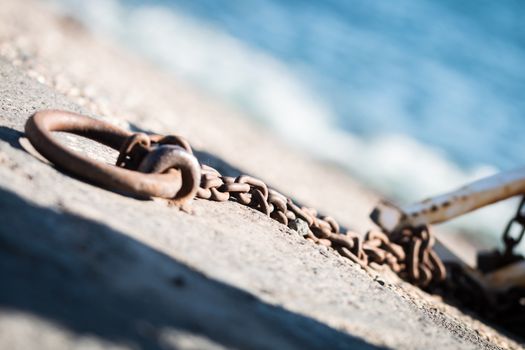 Rusty chains for small fishing boats in Riposto