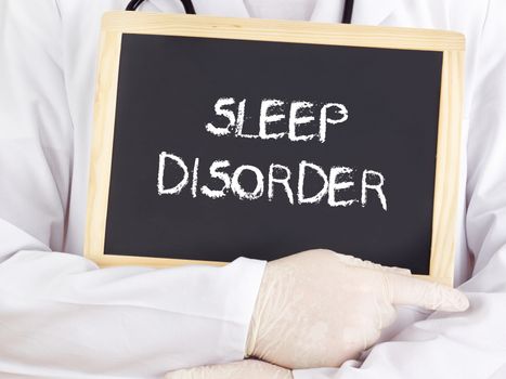 Doctor shows information on blackboard: sleep disorder