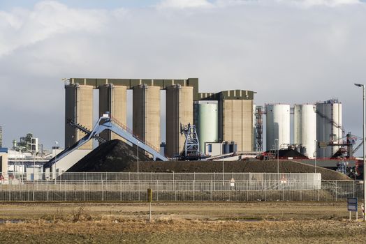 metal storage silo on the second maasvlakte in industrial area europoort in Holland