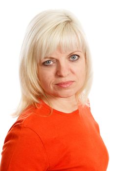 A blond woman wearing a orange top