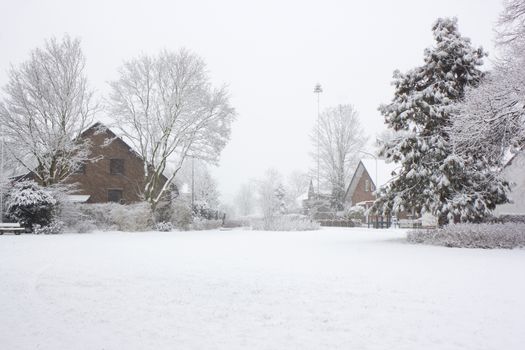 snowfall in the village - winter landscape