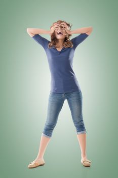 Excited Asian young girl, full length portrait isolated.