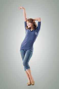 Excited Asian young girl, full length portrait isolated.