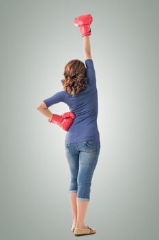 Fighting girl concept, rear view full length portrait of Asian isolated on white.