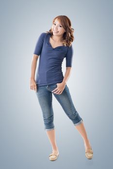 Excited Asian young girl, full length portrait isolated.