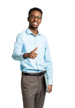 Happy african american college student standing with laptop and finger up on white background