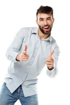 A young bearded man smiling with a fingers up isolated on white background