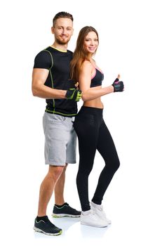 Athletic man and woman after fitness exercise with a finger up on the white background