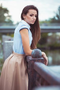 Young beautiful, elegantly dressed woman, summer and lifestyle