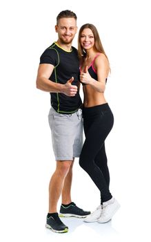 Athletic man and woman after fitness exercise with a finger up on the white background