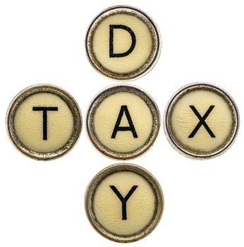 tax day crossword in old round typewriter keys isolated on white