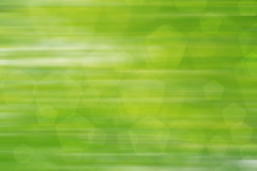 abstract green nature background, pentagon bokeh, fast motion