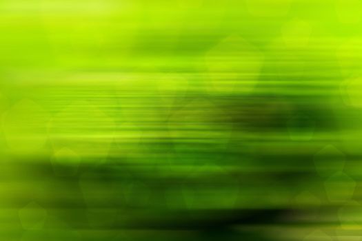 abstract green nature background, pentagon bokeh, fast motion