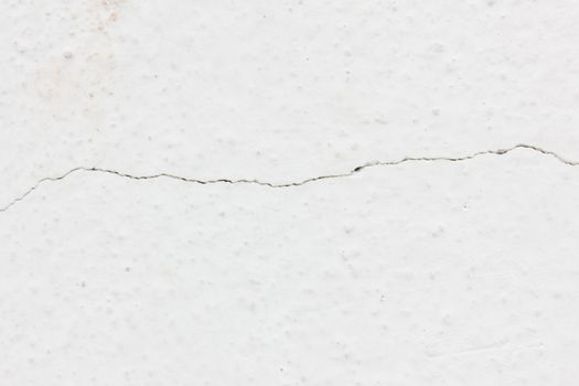 white background of natural cement or stone with crack