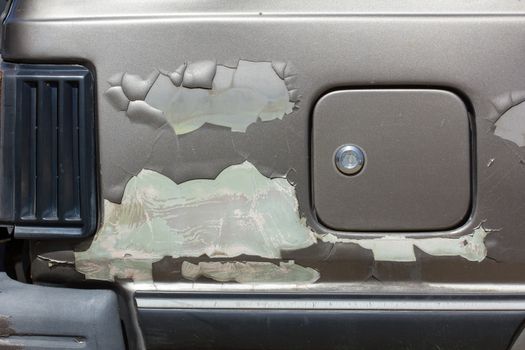 Cracked paint on car body