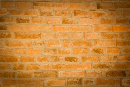 red brick wall texture background with vignetted corners to interior design