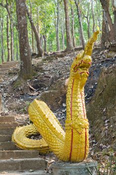 golden giant snake, Naka, south east asian Dragon on a temple staircase, thailand