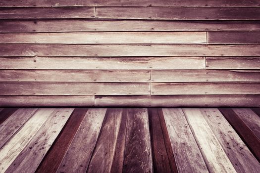 room interior with old wooden wall and wood floor background, with vignette, retro style