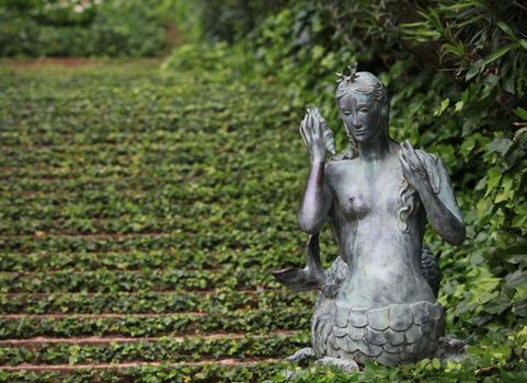 Bronze Mermaid in the bush