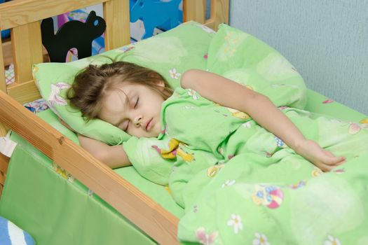 six year old girl Europeans sleeping in her bed