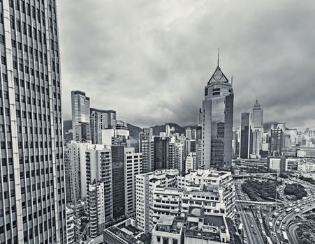 Cityscape of Hong Kong with high buildings in daytime, high angle view.